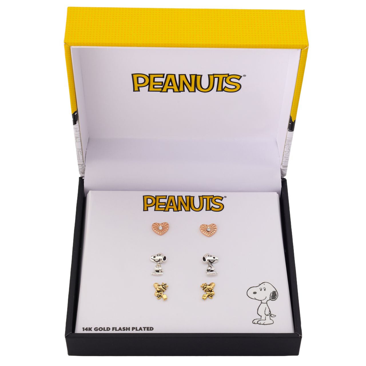 Lifestyle presentation of the Peanuts crystal heart earring trio set displayed in its packaging