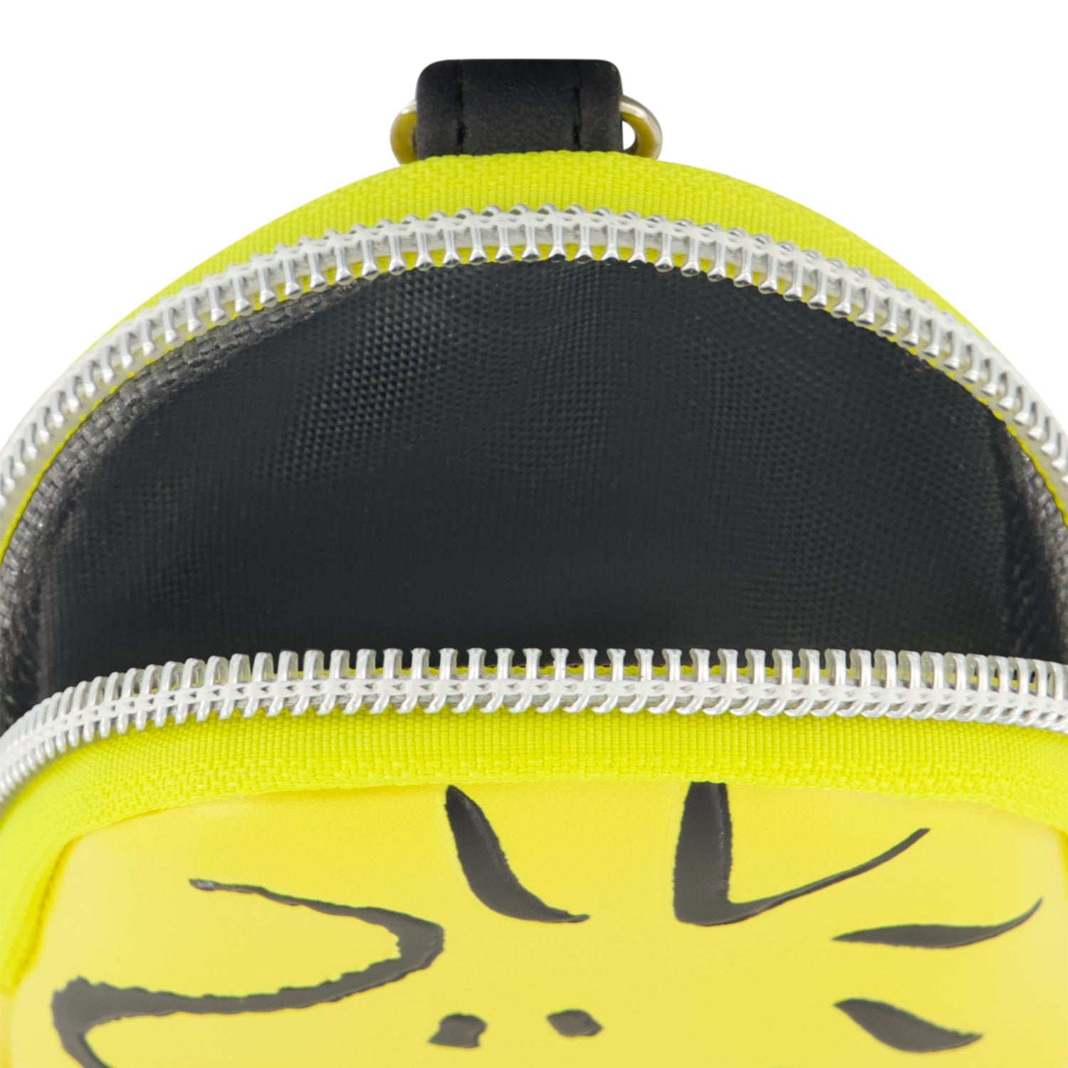 Side view of the small zippered wallet showing the compact profile and black zipper track.