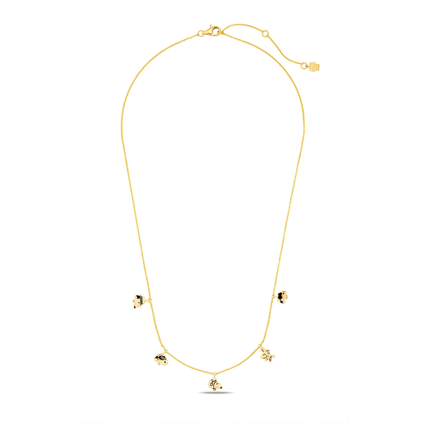 Close up detail of the Snoopy and Woodstock gold charms on a delicate link chain