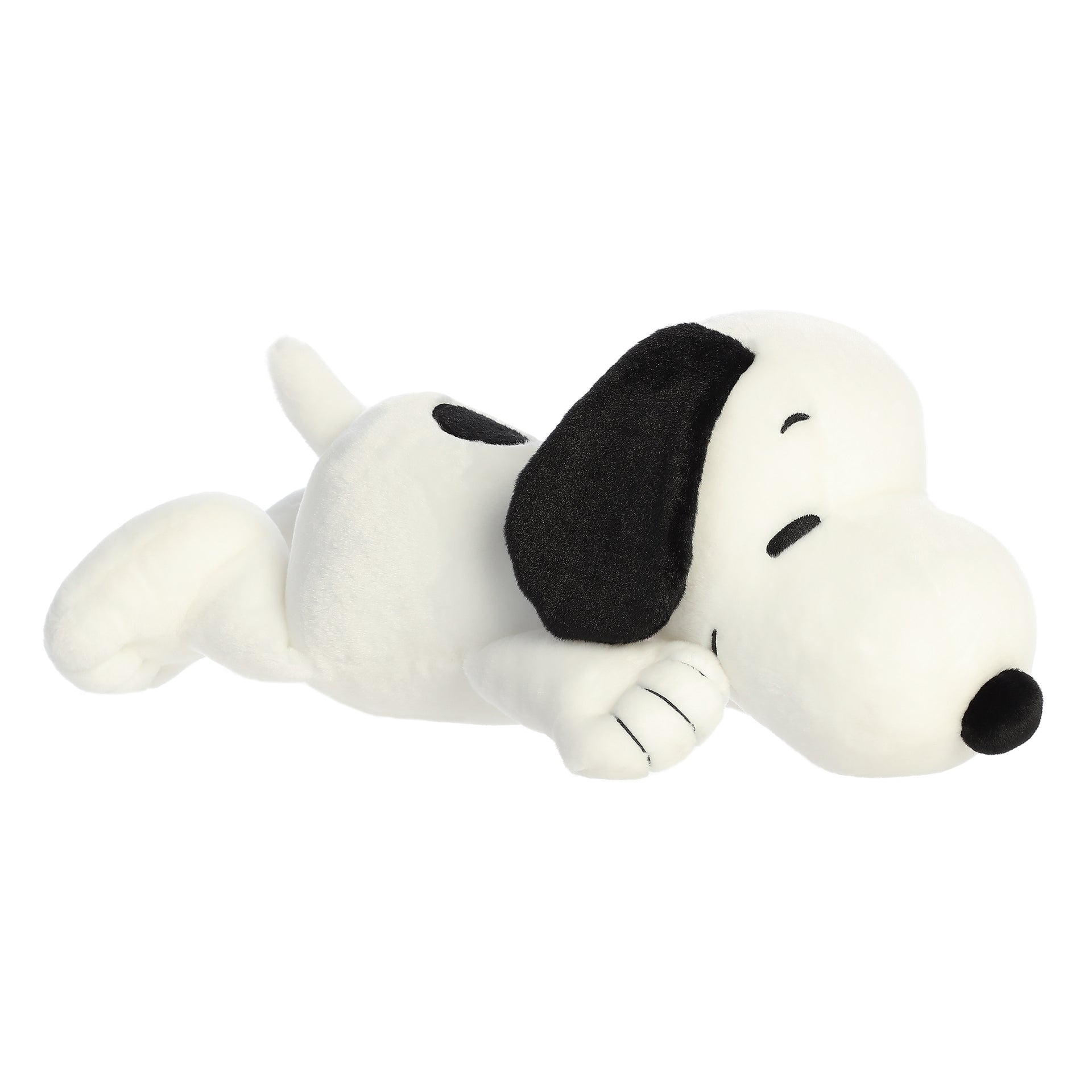 Front view of an 18-inch Snuggle Snoopy plush toy in a relaxed laying pose with soft white fur and floppy black ears