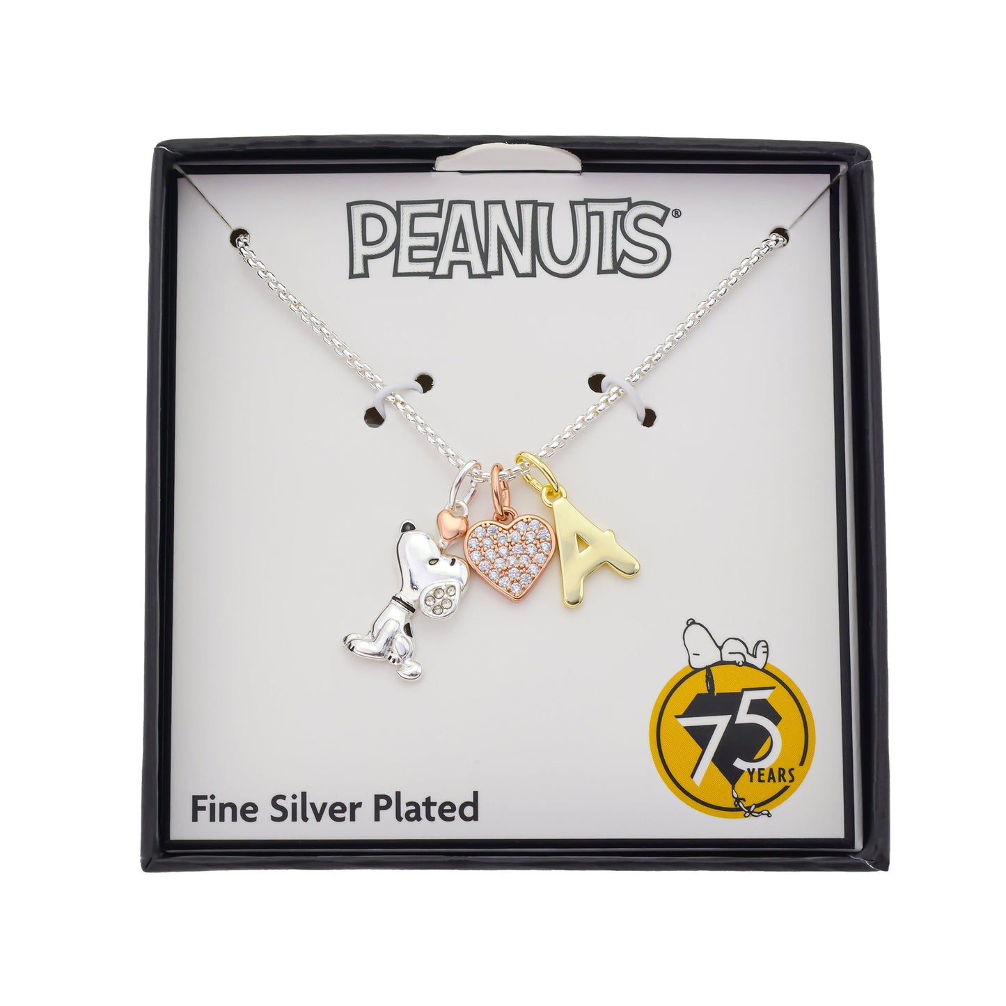 Close-up view of the Snoopy charm, sparkling cubic zirconia heart, and personalized initial suspended together