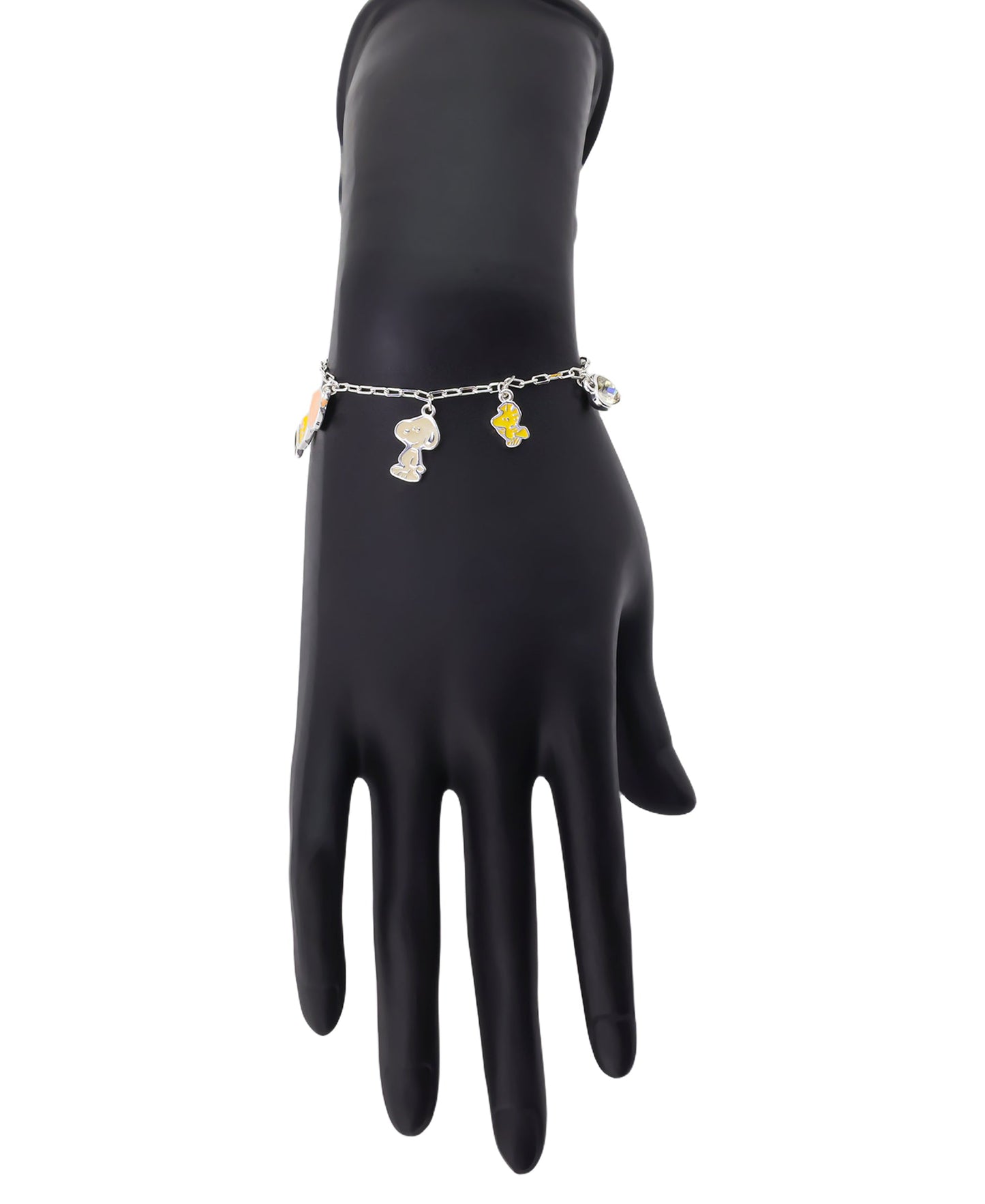 Flat lay view of the Peanuts charm bracelet displayed against a neutral background