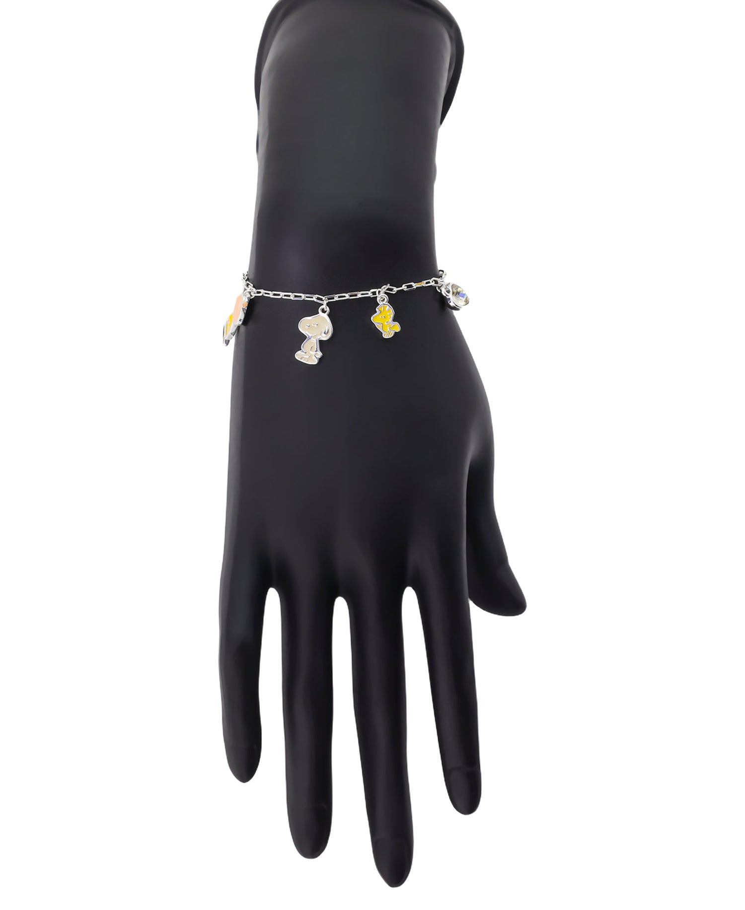 Flat lay view of the Peanuts charm bracelet displayed against a neutral background