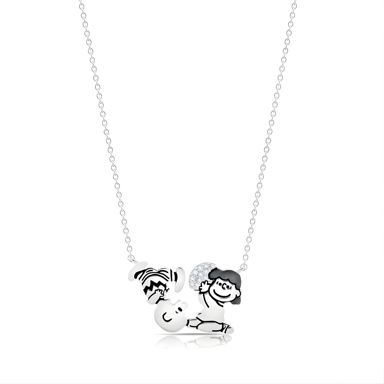 Peanuts x Crislu sterling silver necklace featuring Charlie Brown running toward a football held by Lucy van Pelt.