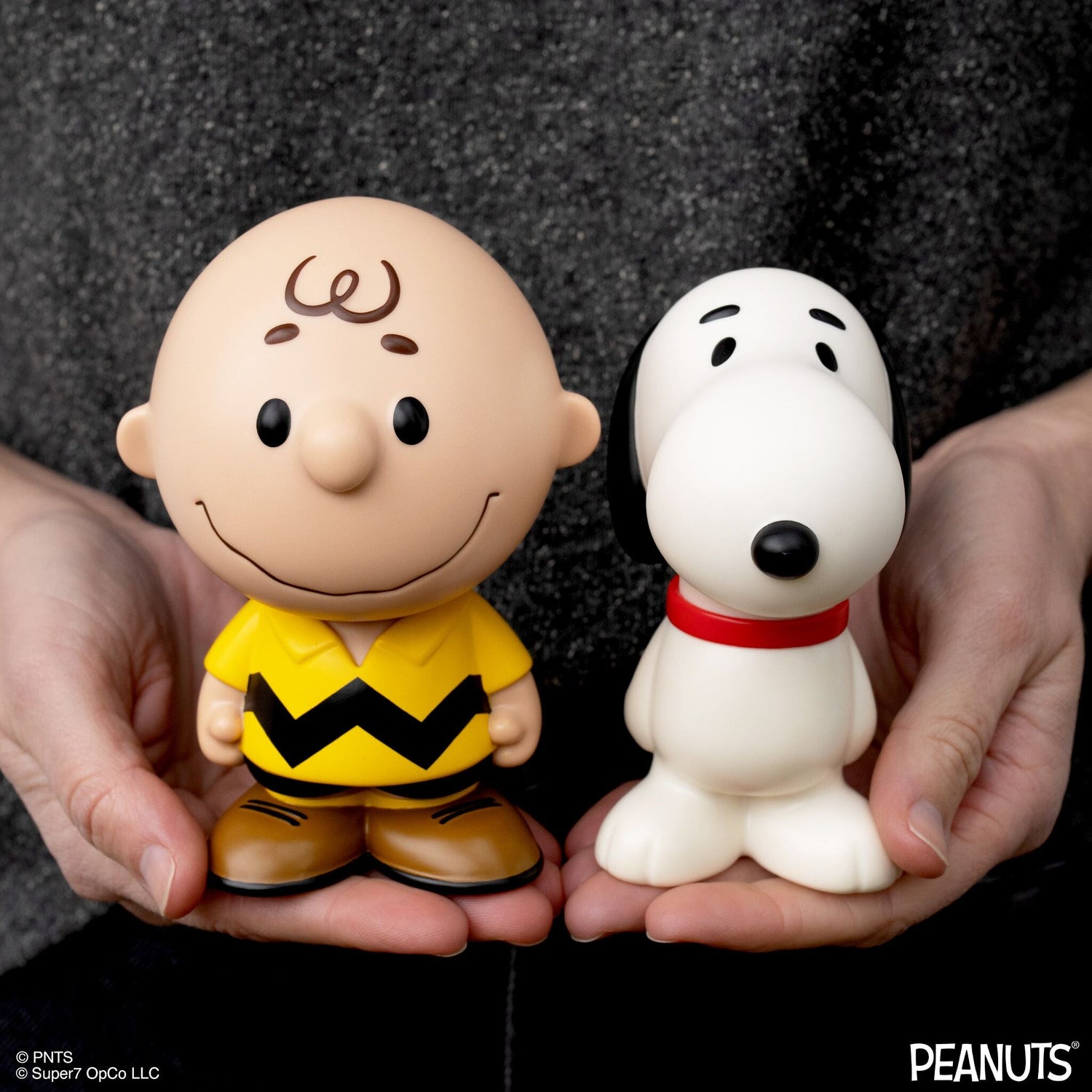 Super7 Peanuts Charlie Brown yellow shirt figure on a white background.