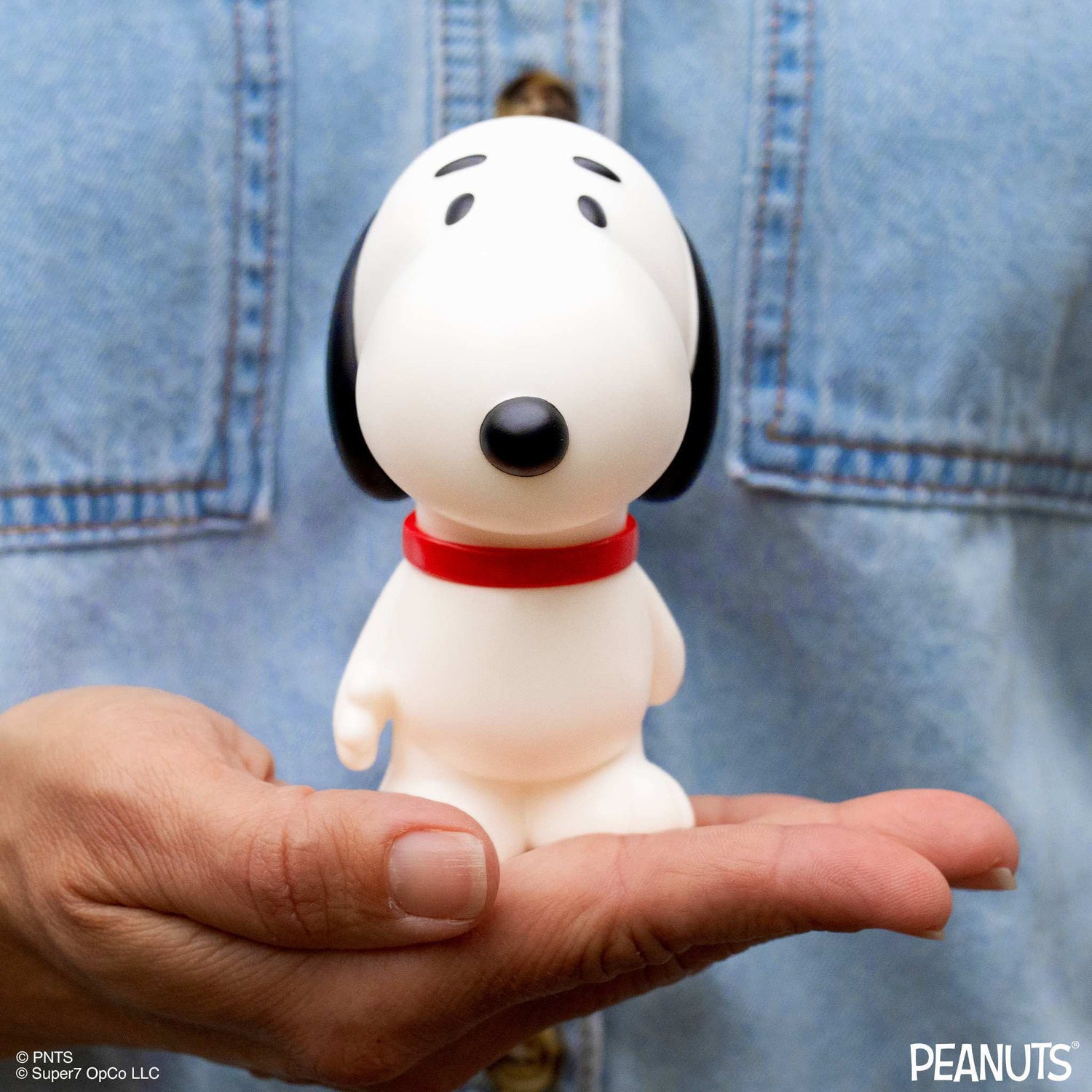 Side profile of the walking Snoopy figure highlighting the mid-century sculpted design