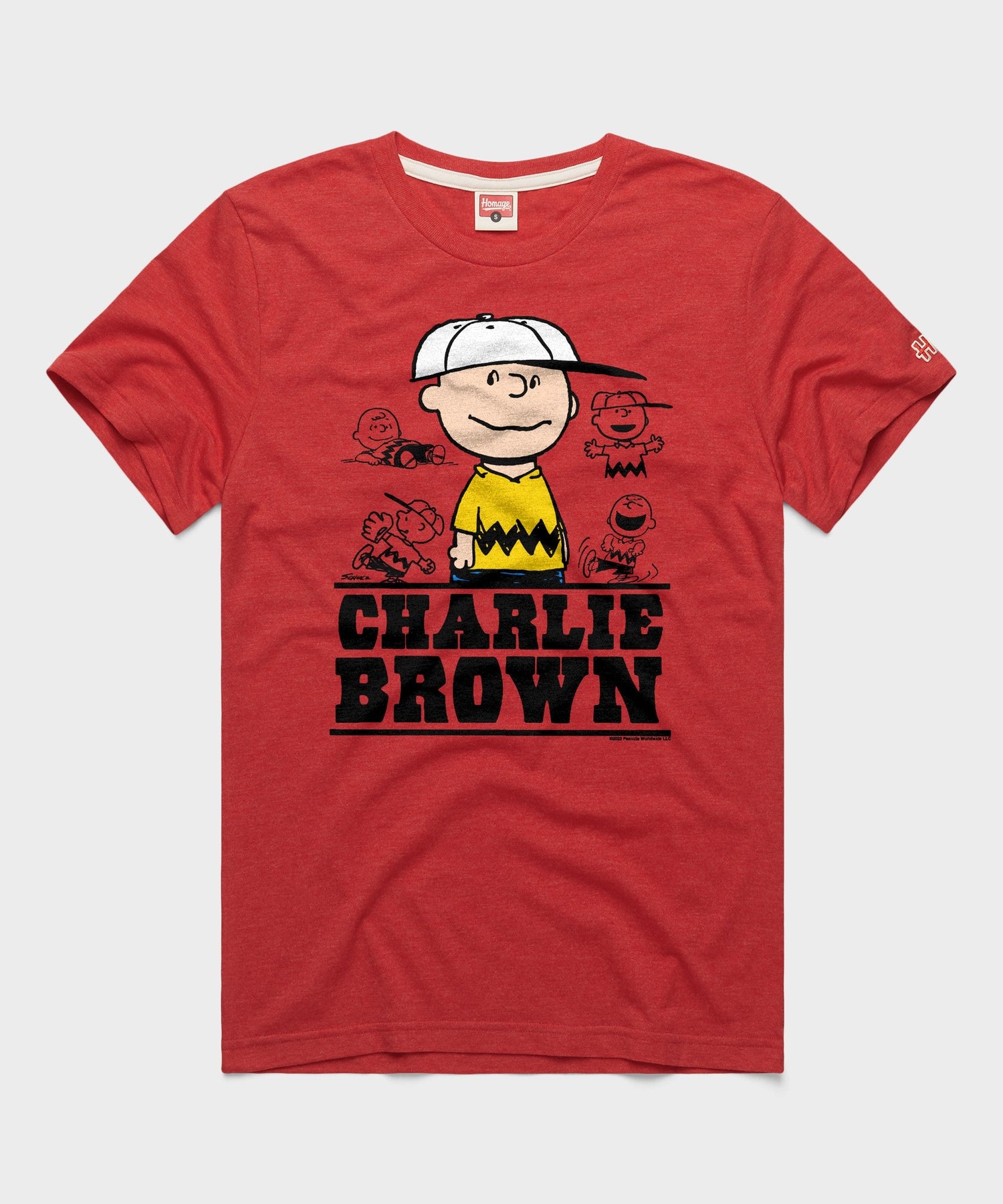 Red crewneck t-shirt featuring a vintage Charlie Brown graphic printed on the front chest