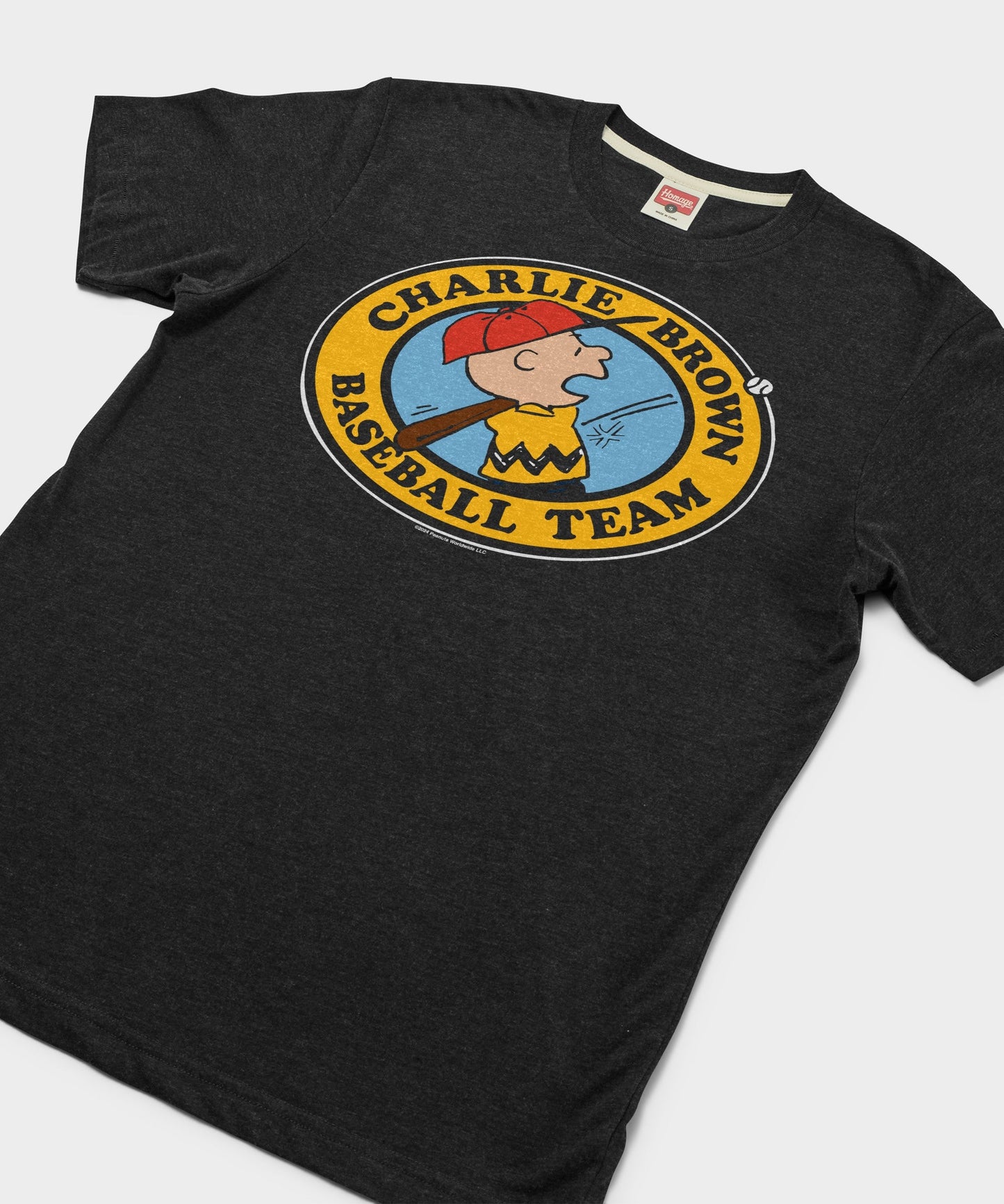 Close-up view of the vintage-style Peanuts baseball team graphic print
