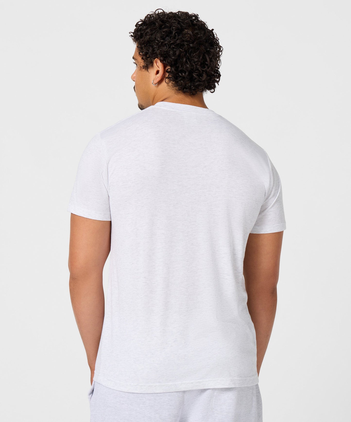 Close-up view of the ultra-soft fabric texture and collar detail on the ash t-shirt