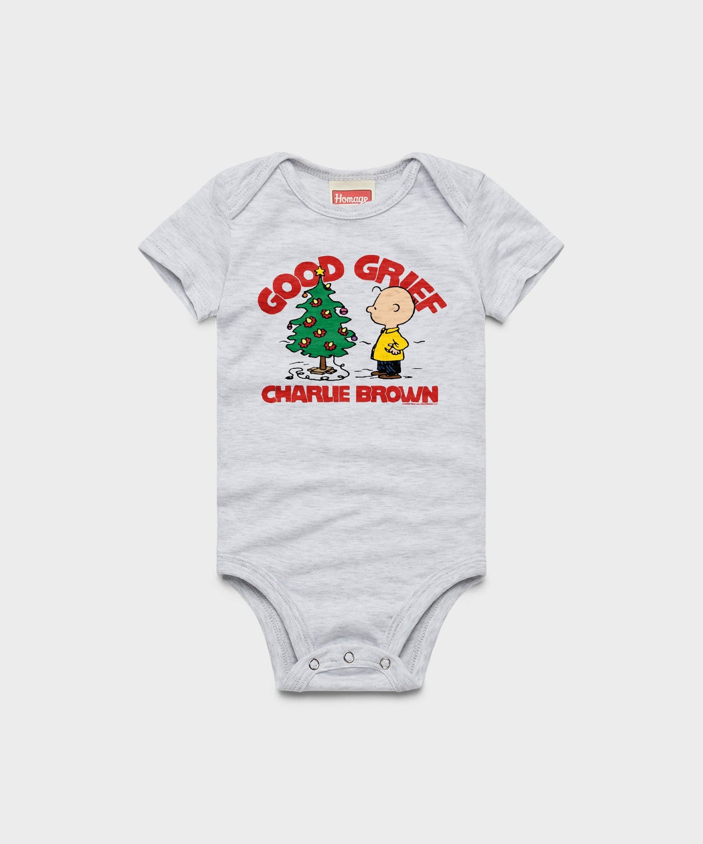 Ash baby one piece featuring Charlie Brown standing beside his tiny tree on the front chest