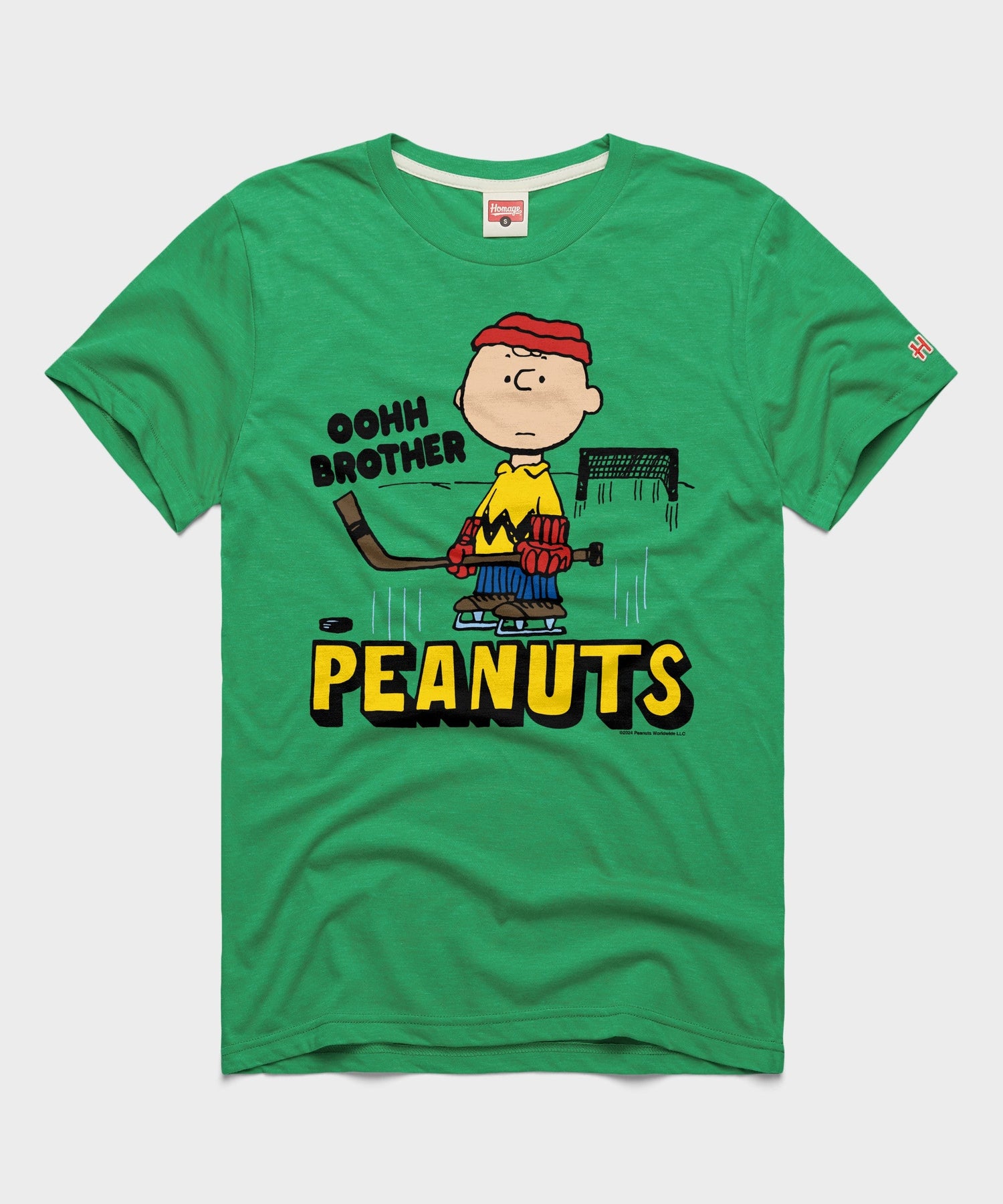 Green HOMAGE crew-neck t-shirt featuring a vintage Charlie Brown hockey graphic on the chest