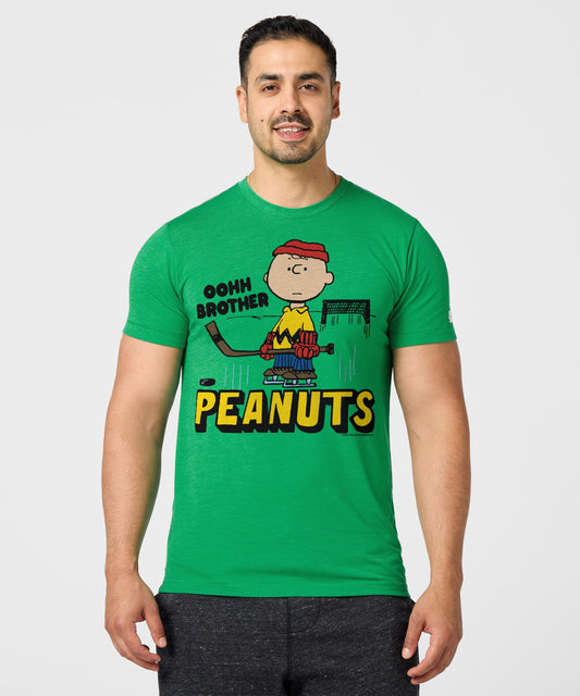 Green HOMAGE crew-neck t-shirt featuring a vintage Charlie Brown hockey graphic on the chest-2