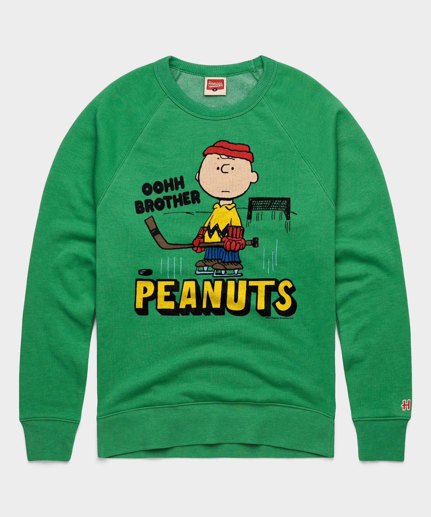 Green HOMAGE crewneck sweatshirt featuring a vintage Charlie Brown graphic centered on the chest