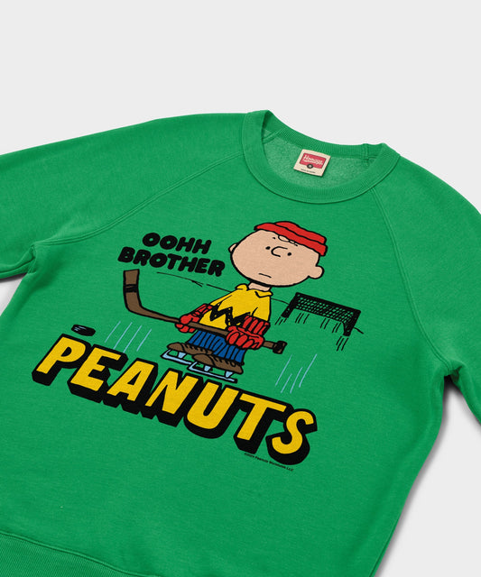 Green HOMAGE crewneck sweatshirt featuring a vintage Charlie Brown graphic centered on the chest-1