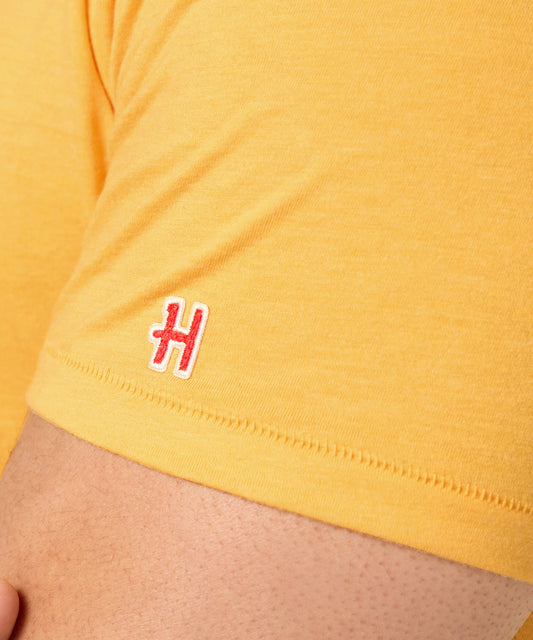 Gold crewneck t-shirt featuring a vintage Charlie Brown graphic centered on the front chest-4
