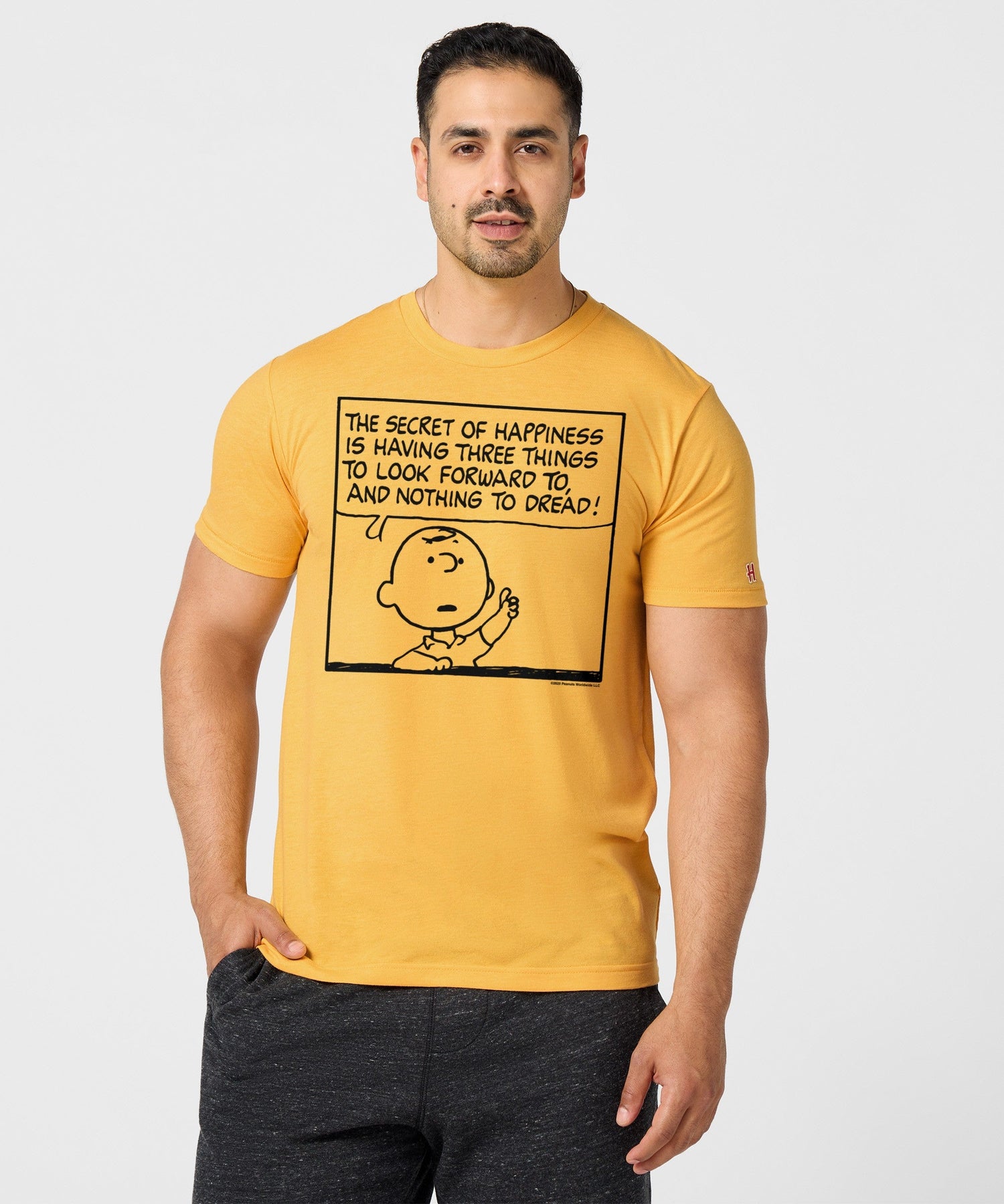 Side view of the Peanuts t-shirt showing the relaxed fit and short sleeves