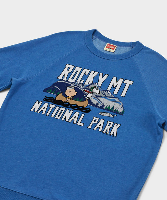 Royal blue crewneck sweatshirt featuring Charlie Brown and a Rocky Mountain National Park graphic on the front chest-1