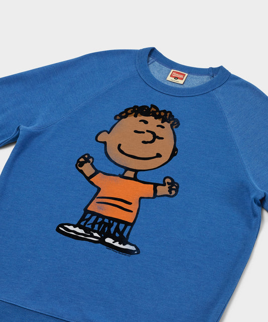 Royal blue crewneck sweatshirt featuring a graphic of Franklin from Peanuts centered on the front-1