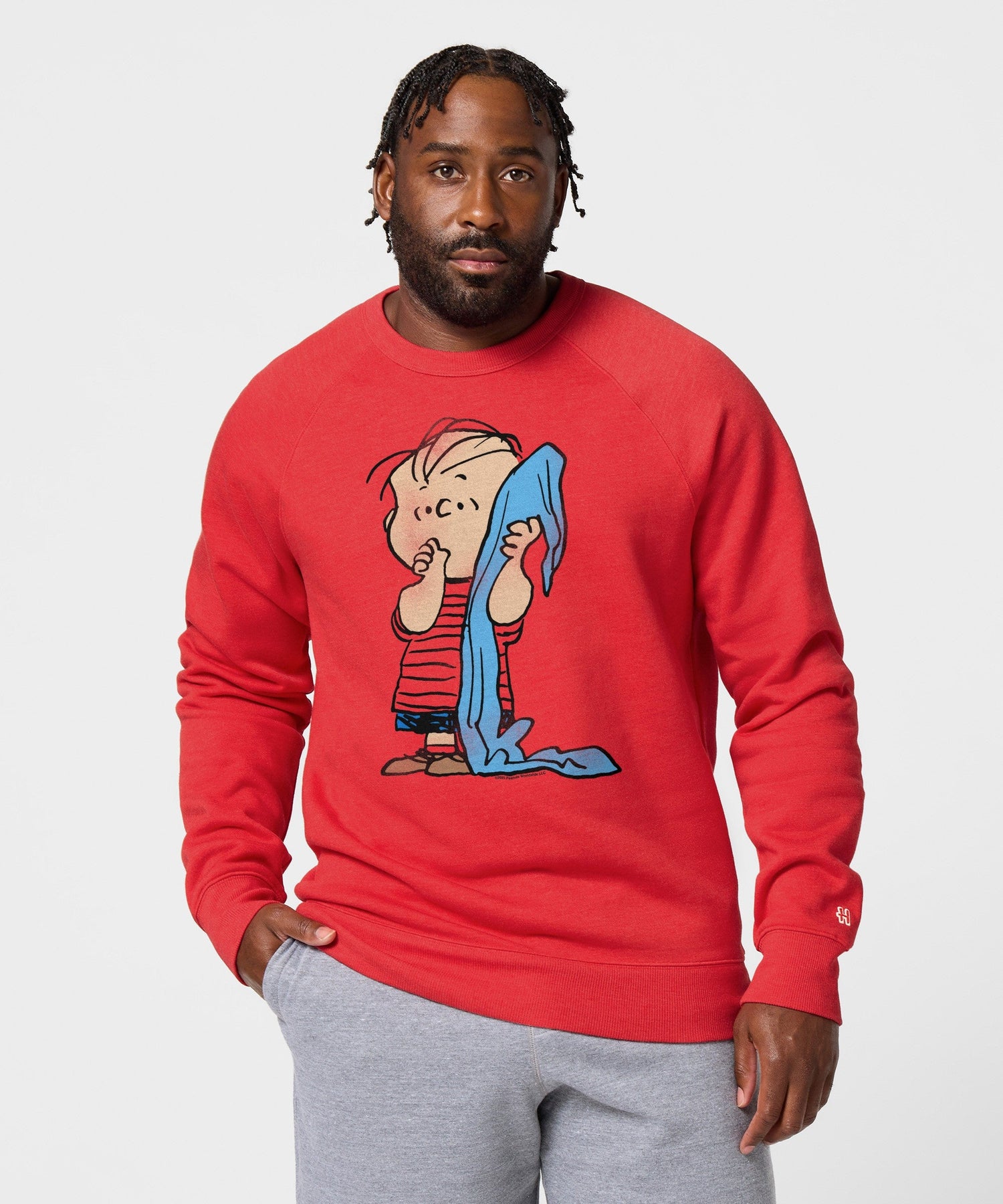 Back view of the red crew-neck sweatshirt, showing the plain solid red back and ribbed hem