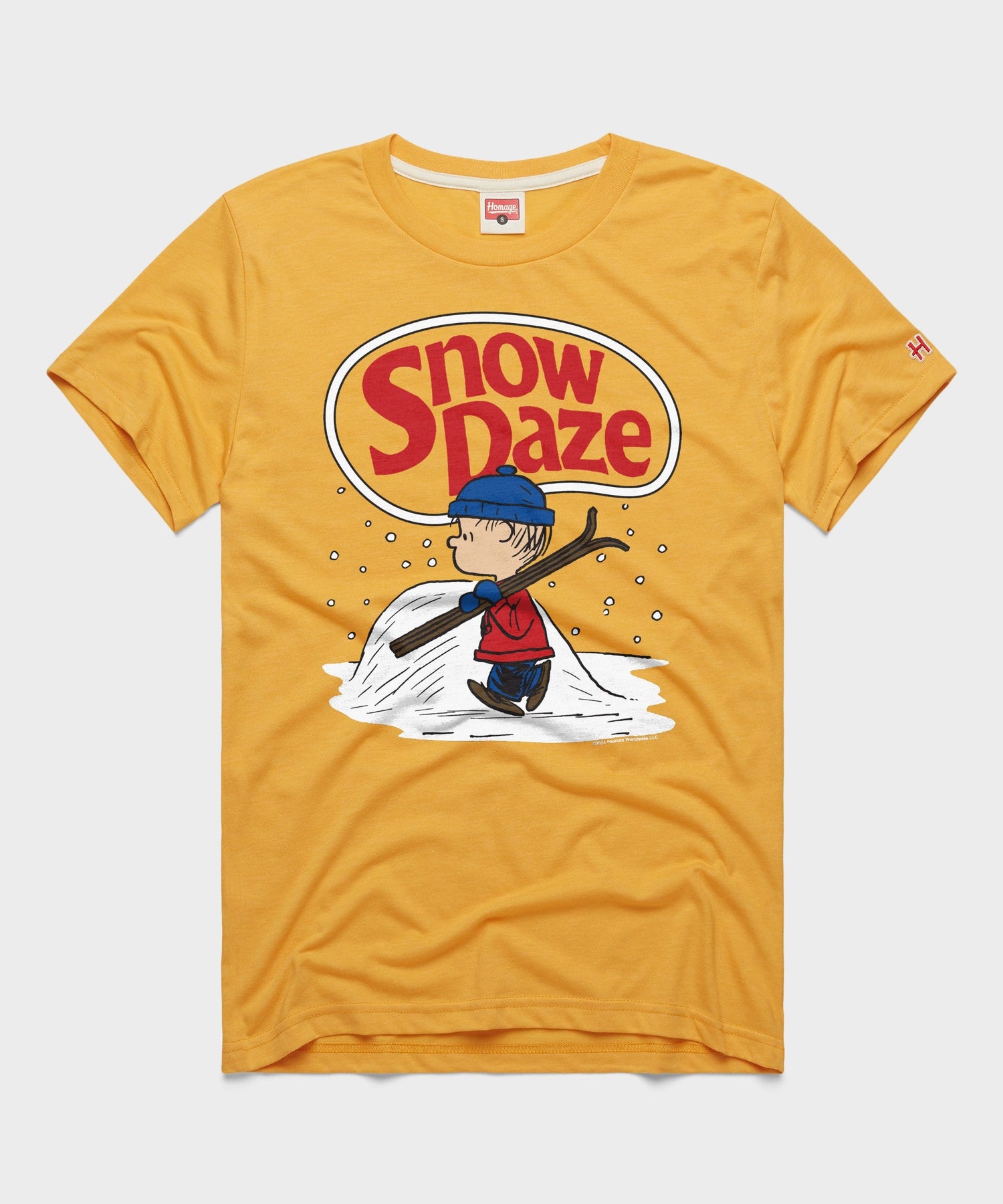 Gold short-sleeve t-shirt featuring a vintage-inspired Linus snow day graphic centered on the front chest