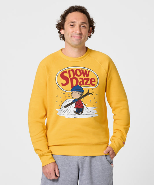 Gold crewneck sweatshirt featuring Linus standing with his blue blanket in the snow on the chest-2