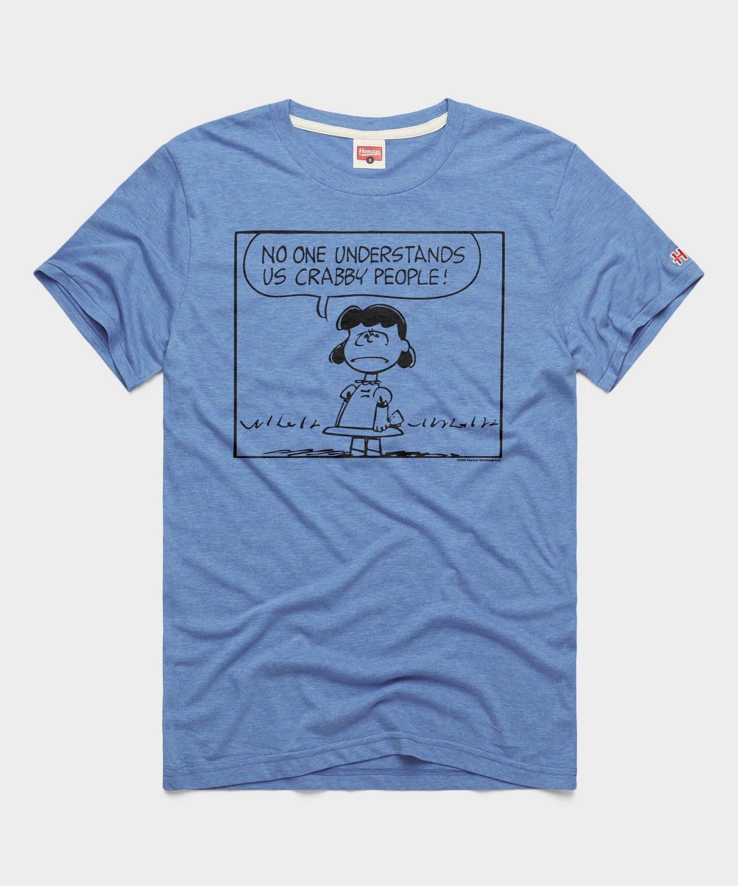 Light blue HOMAGE x Peanuts t-shirt featuring a graphic of Lucy van Pelt with the text Crabby People centered on the front