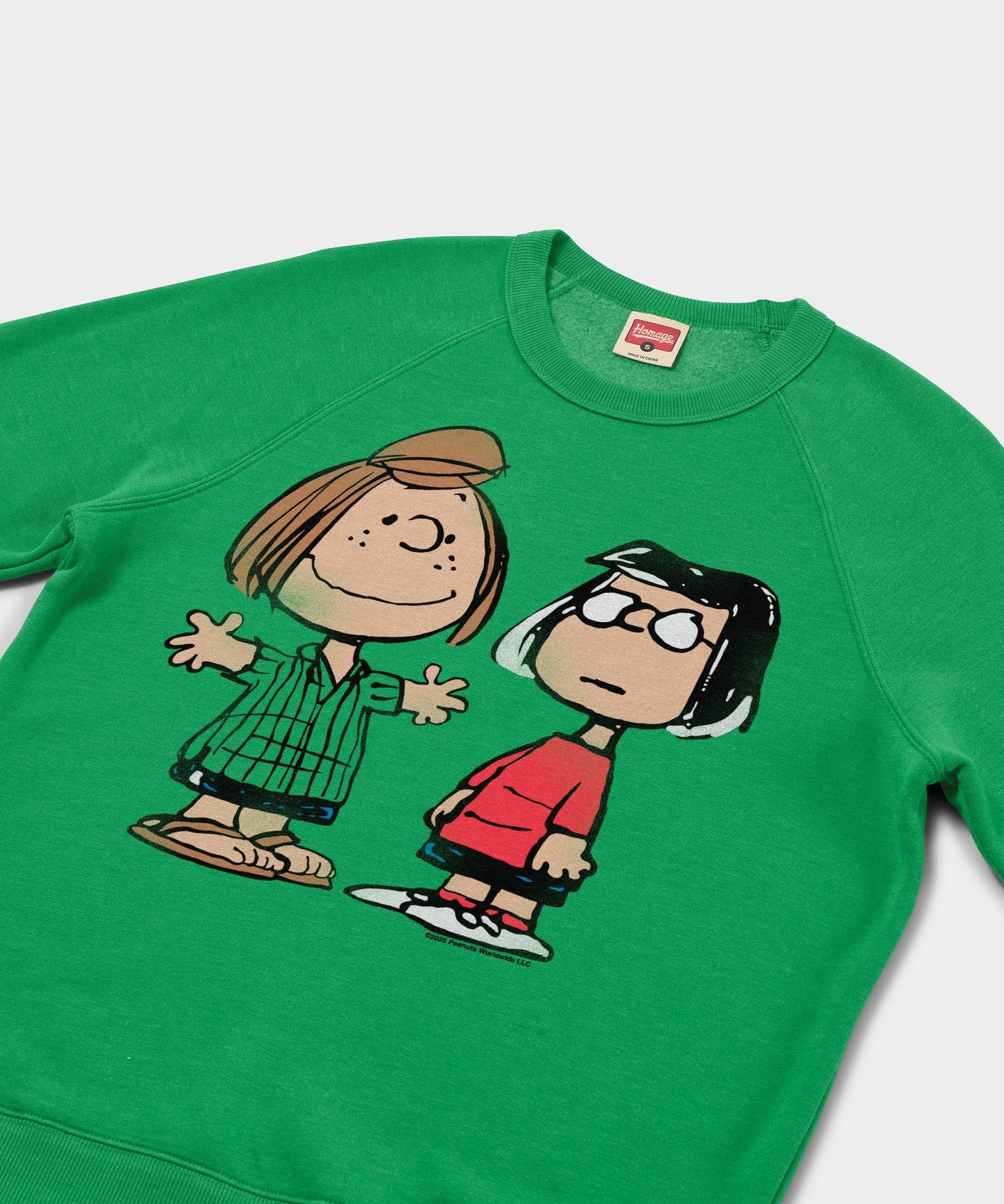 Close-up view of the Peppermint Patty and Marcie screen-printed graphic on the chest