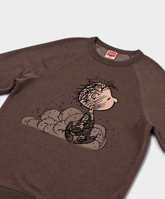 Brown crewneck sweatshirt featuring Pig-Pen wrapped in a cloud of dust on the front chest-1