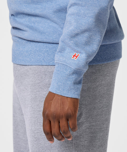 Light blue crewneck sweatshirt featuring Sally Brown with her arms crossed on the front center-4