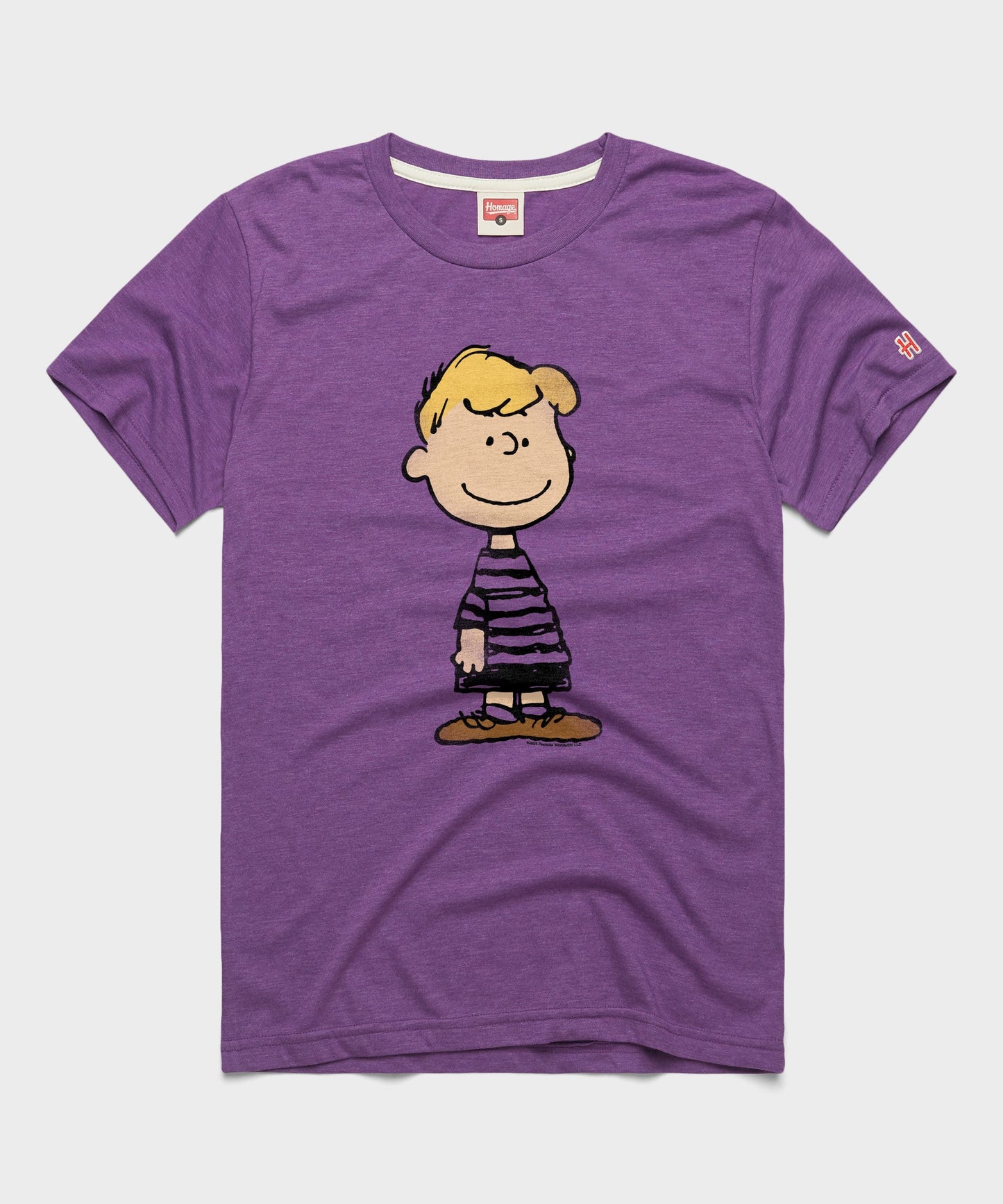 Royal purple t-shirt featuring Schroeder playing his toy piano on the front chest