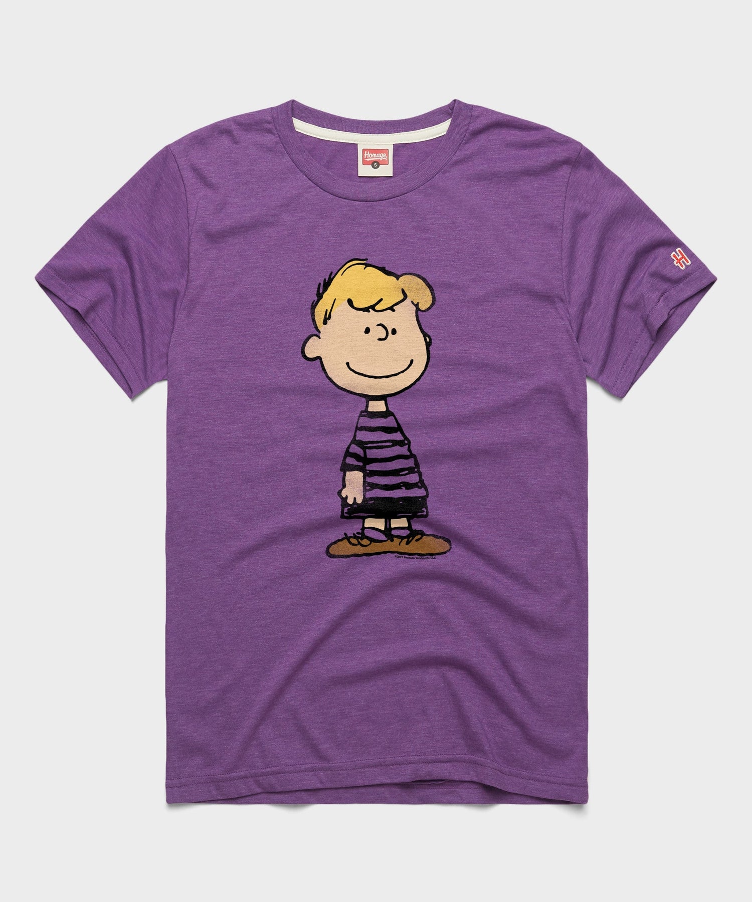 Royal purple t-shirt featuring Schroeder playing his toy piano on the front chest