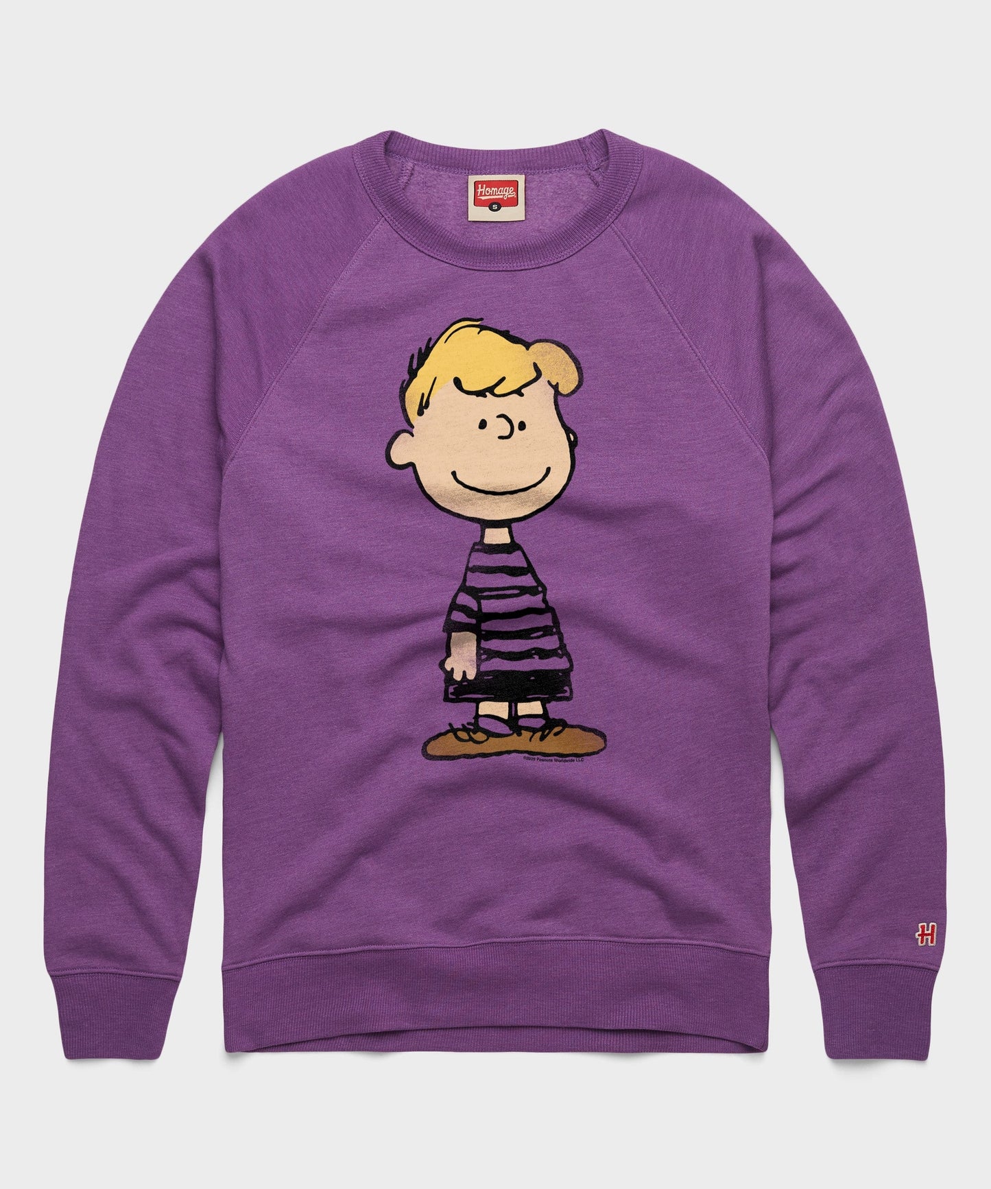 Royal purple crew-neck sweatshirt featuring a graphic of Schroeder playing his piano on the front chest