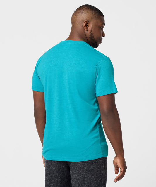 Teal crewneck t-shirt featuring a vintage-inspired graphic of Snoopy as Joe Cool wearing sunglasses on the chest-3