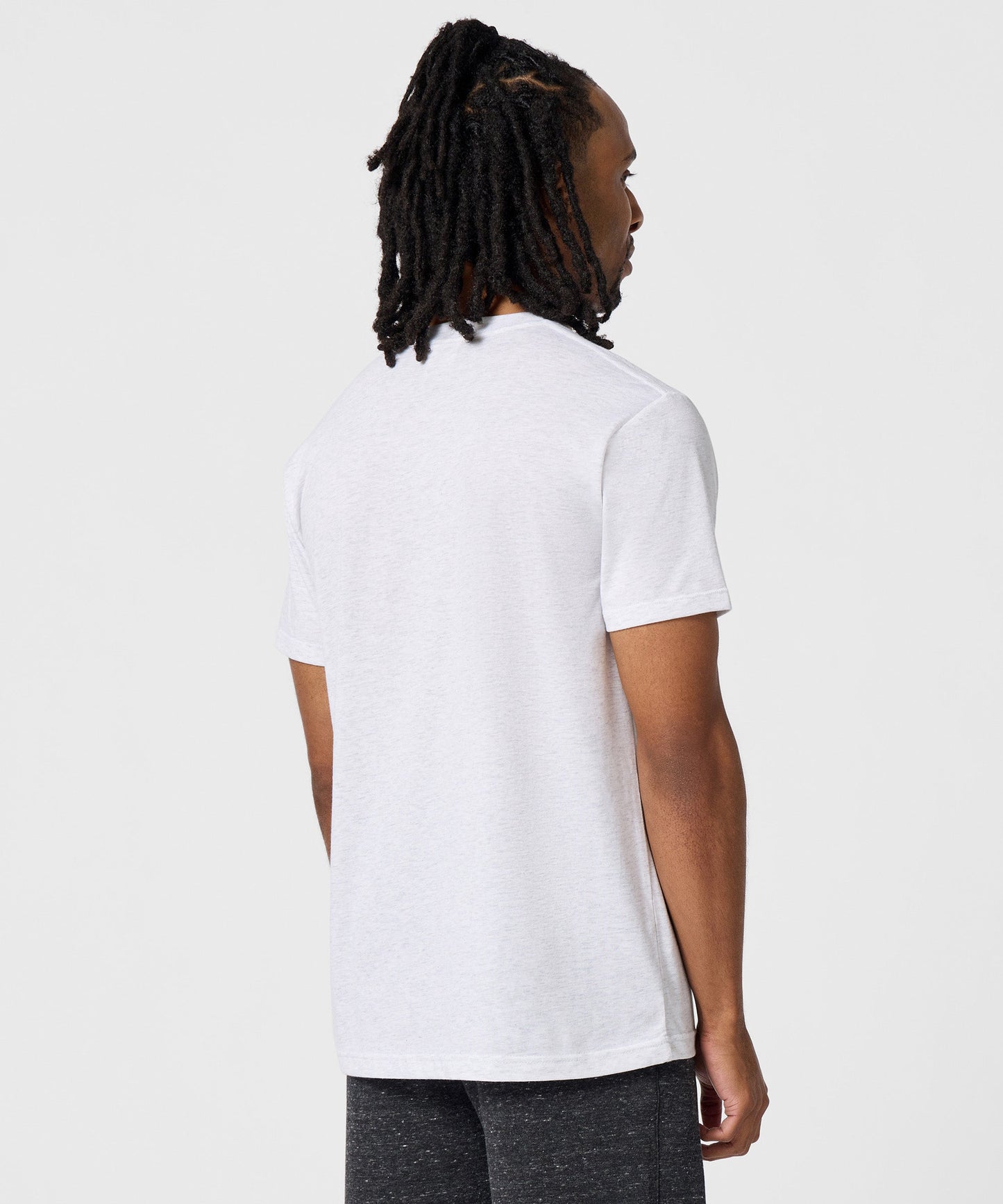Detailed close-up of the ultra-soft fabric texture and hem stitching on the t-shirt