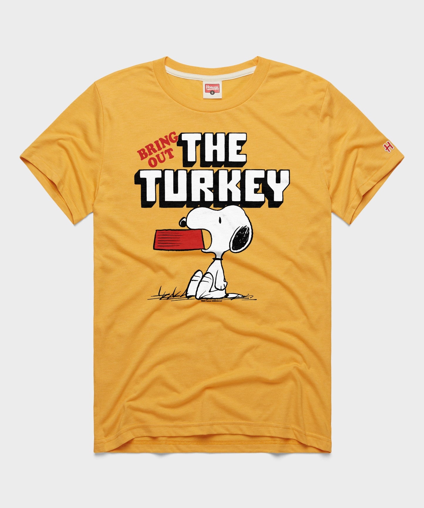 Gold crew-neck t-shirt featuring Charlie Brown and Snoopy graphic on the front chest