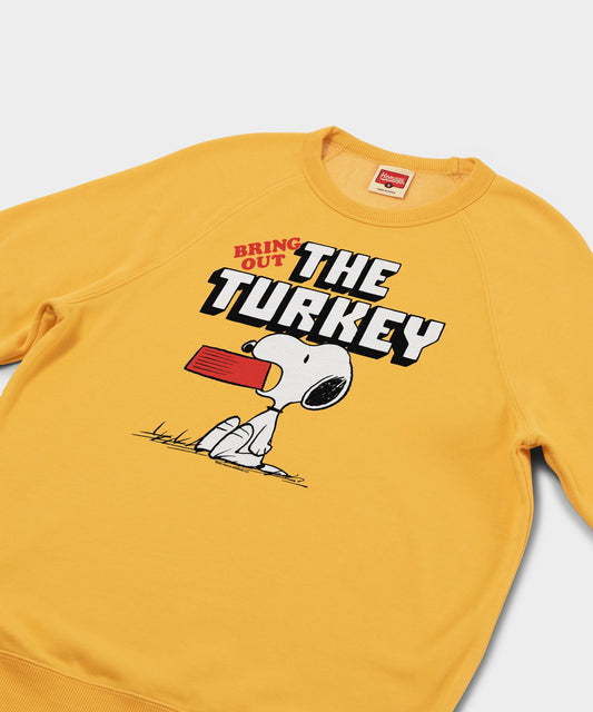 Gold crewneck sweatshirt featuring Snoopy and a Bring Out The Turkey graphic on the front chest-1