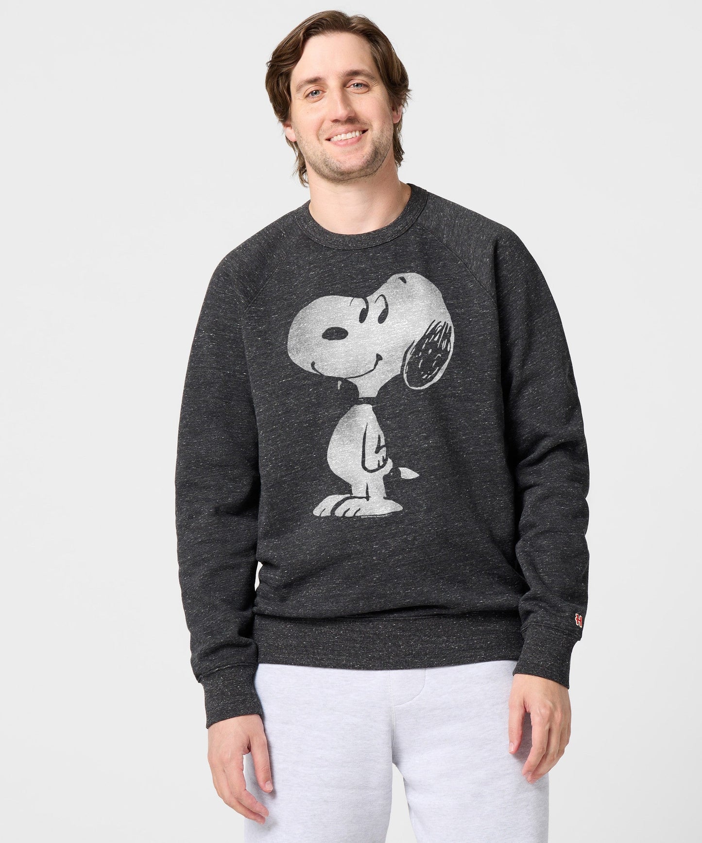Back view of the charcoal crewneck sweatshirt showing the plain, solid fabric and relaxed fit