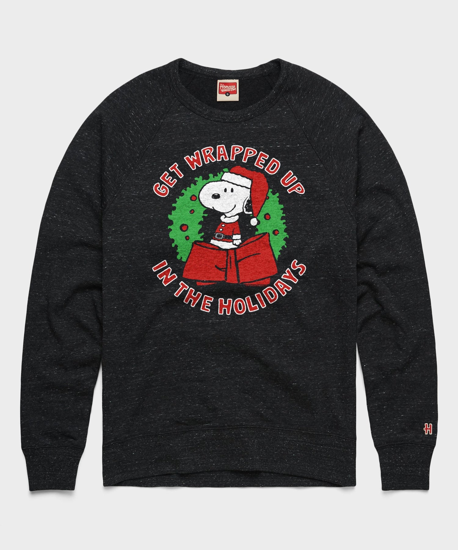 Charcoal crewneck sweatshirt featuring Snoopy getting wrapped up in ribbon on the front chest
