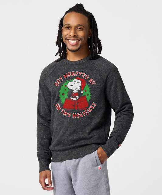 Charcoal crewneck sweatshirt featuring Snoopy getting wrapped up in ribbon on the front chest-2