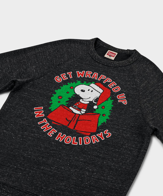 Charcoal crewneck sweatshirt featuring Snoopy getting wrapped up in ribbon on the front chest-1