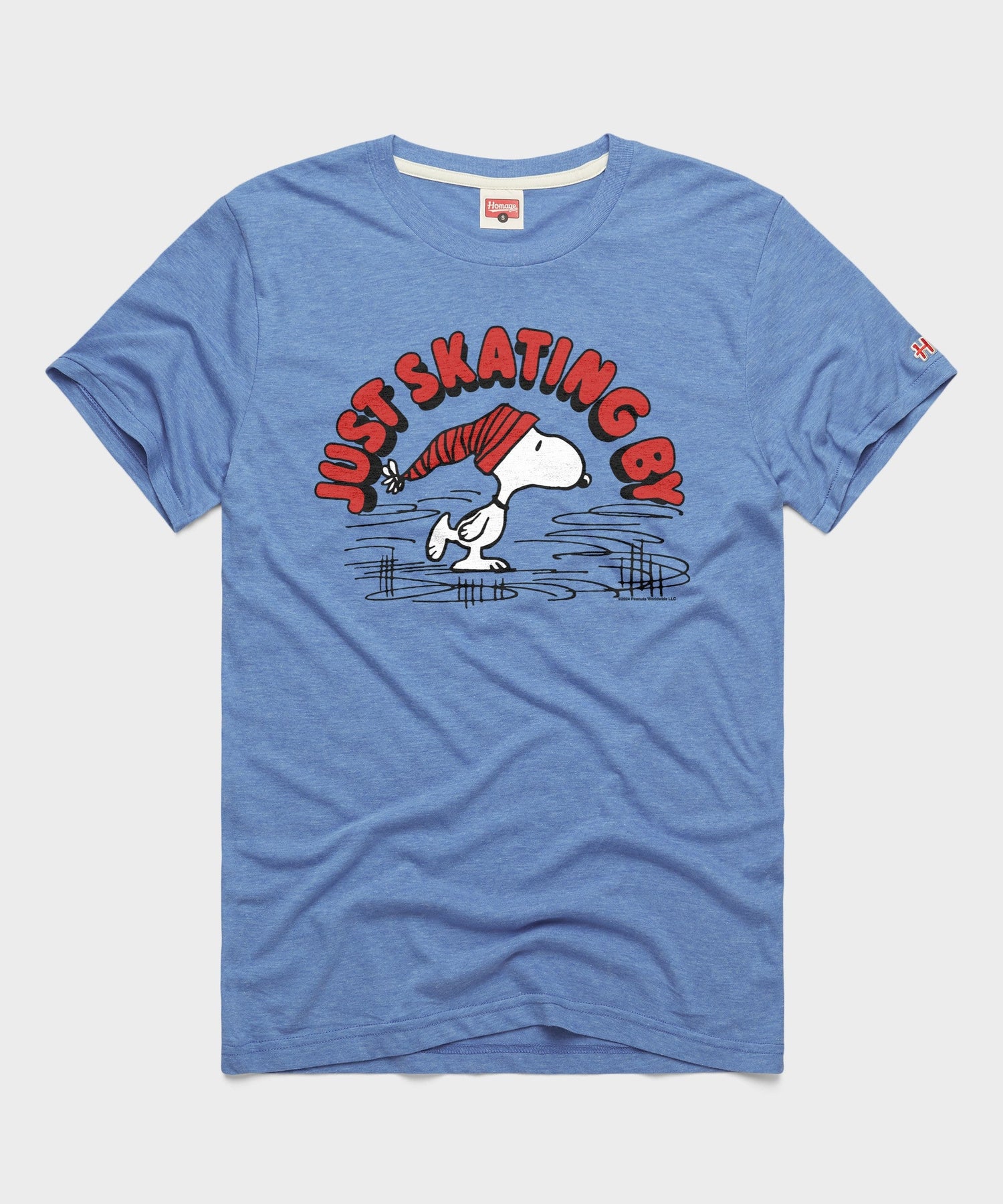 Light blue t-shirt featuring Snoopy ice skating across the front chest