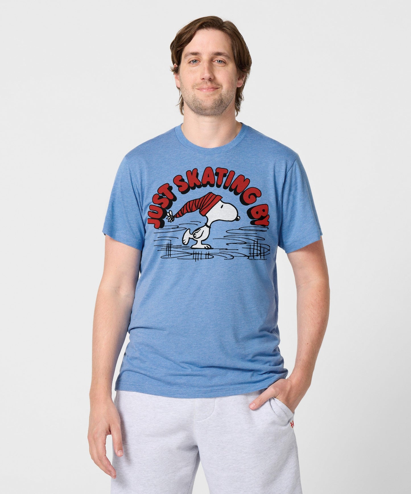 Back view of the light blue Peanuts t-shirt showing a plain solid back