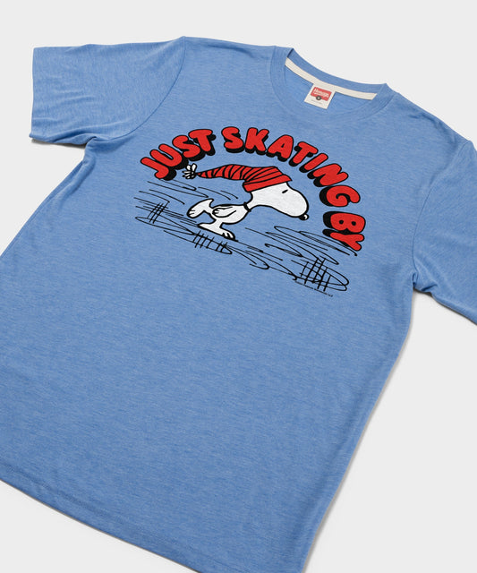 Light blue t-shirt featuring Snoopy ice skating across the front chest-1