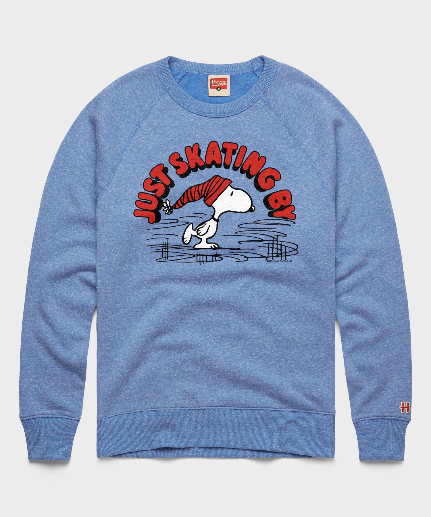 Light blue crewneck sweatshirt featuring Snoopy ice skating across the front chest