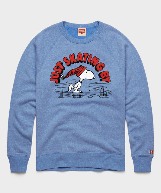 Light blue crewneck sweatshirt featuring Snoopy ice skating across the front chest-0