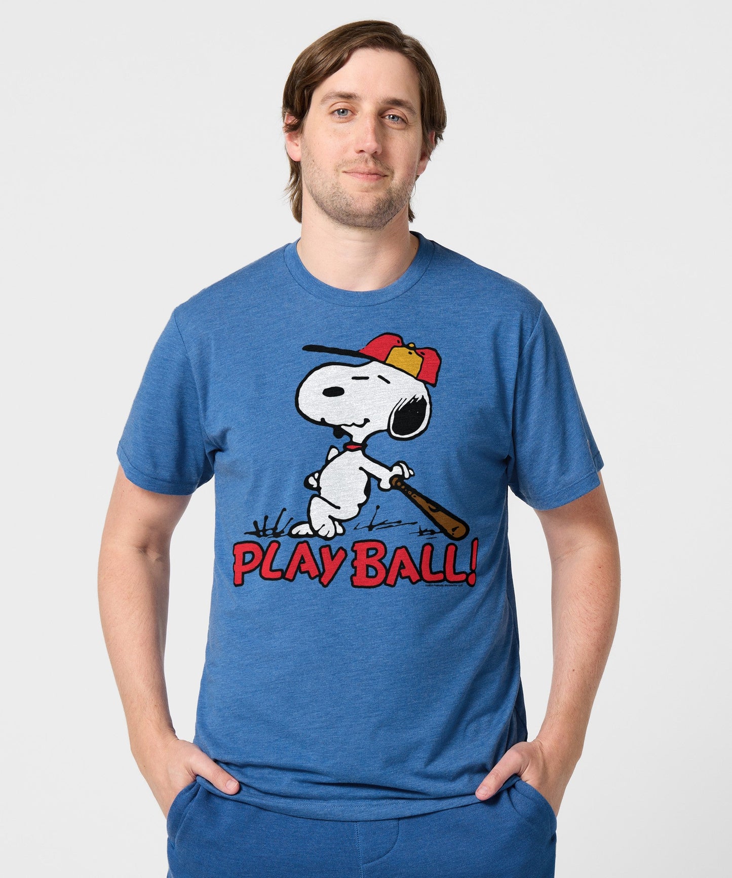 Back view of the royal blue t-shirt showing a clean, solid fabric finish