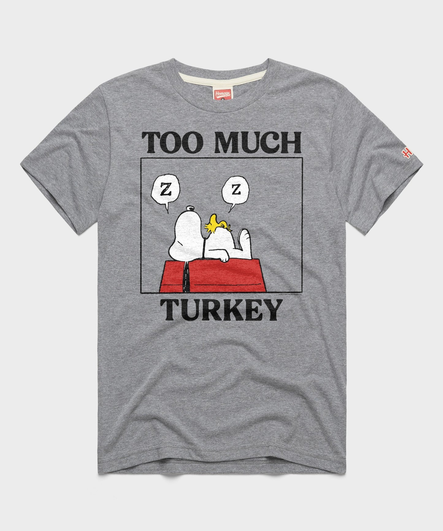 Grey crewneck t-shirt featuring a vintage graphic of Charlie Brown and Snoopy with the text Too Much Turkey on the front