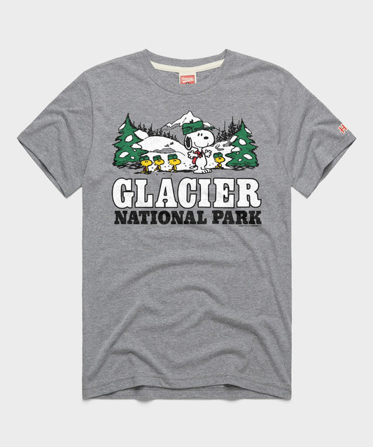 Heather grey unisex t-shirt featuring a vintage graphic of Snoopy resting against a tree in Glacier National Park on the front-0