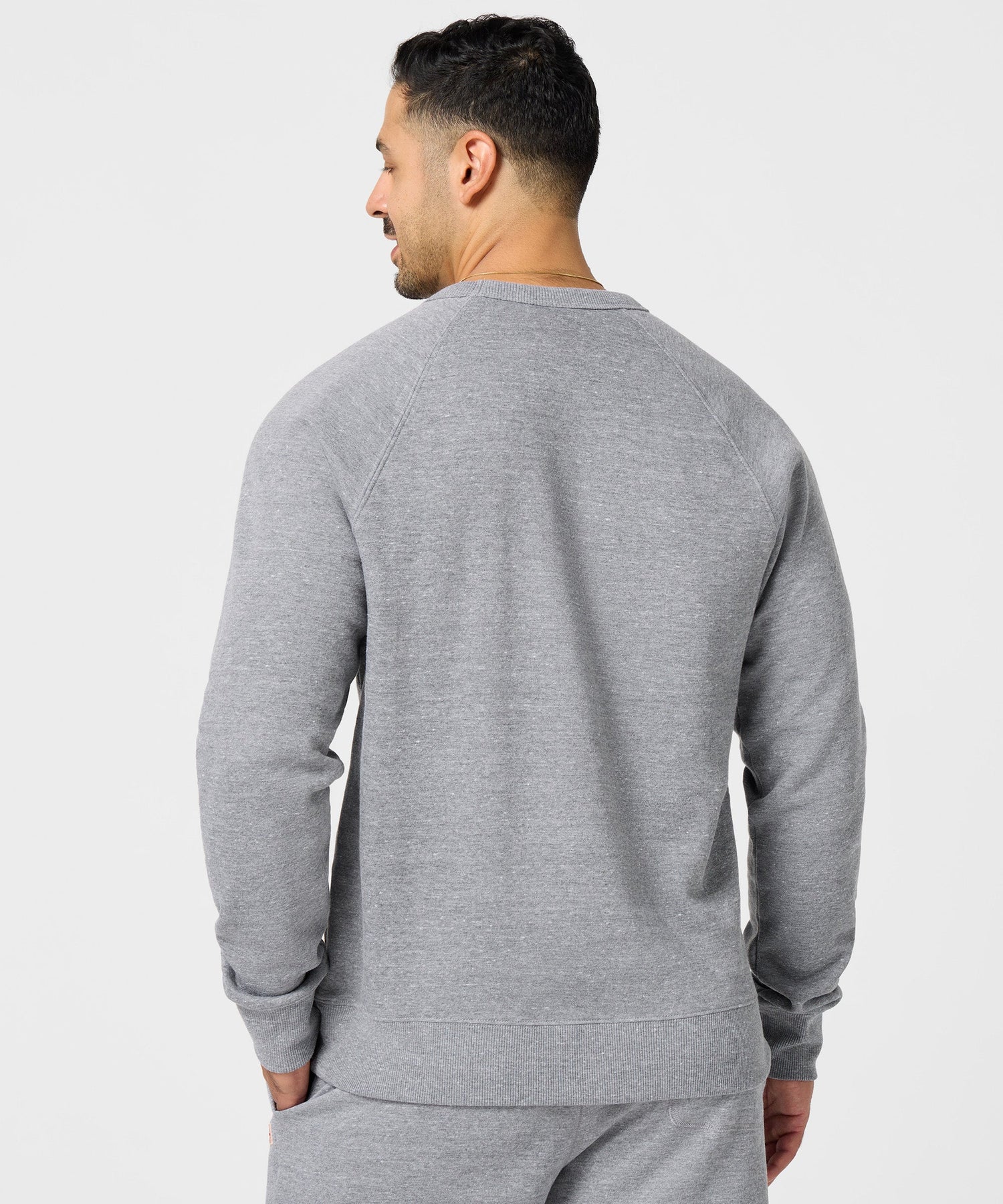 Detailed view of the ribbed collar and neckline stitching on the Peanuts and HOMAGE sweatshirt
