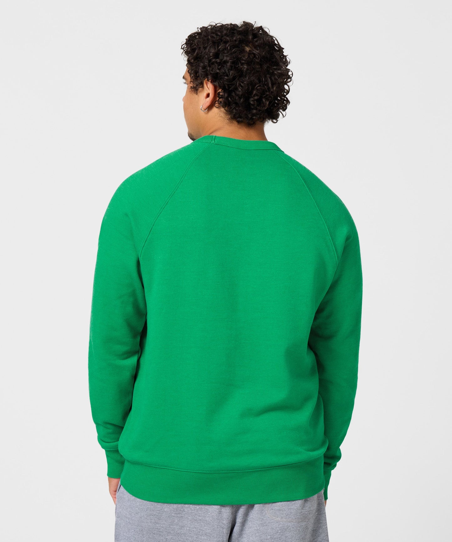 Close-up of the sleeve cuff and hem stitching on the HOMAGE Peanuts sweatshirt